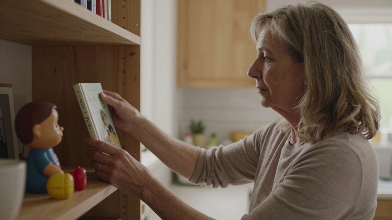 A woman placing a memoir on a shelf beside a child’s toy in a sunlit kitchen.